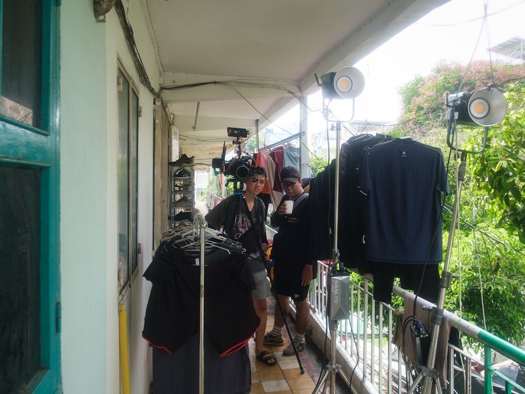 Film set with lighting equipment and camera crew